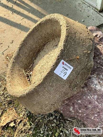 Two Concrete Livestock Feeders