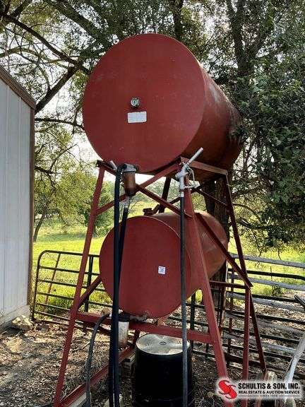 Double Fuel Tank With Hoses and Nozzles