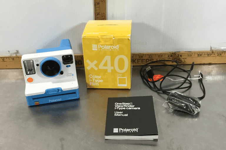 Polaroid Camera With Accessories and Color i-Type Film