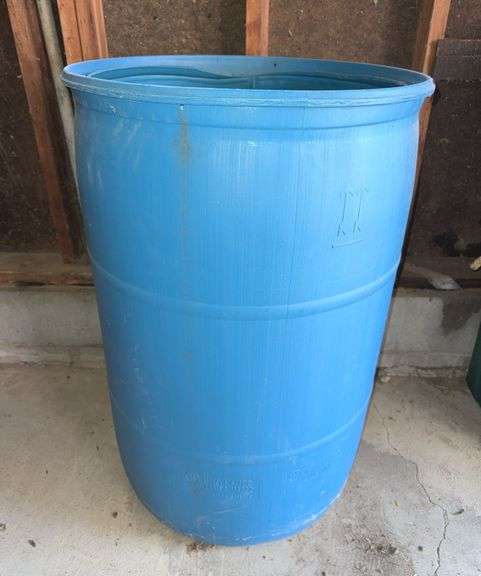 Empty Blue Plastic Barrel