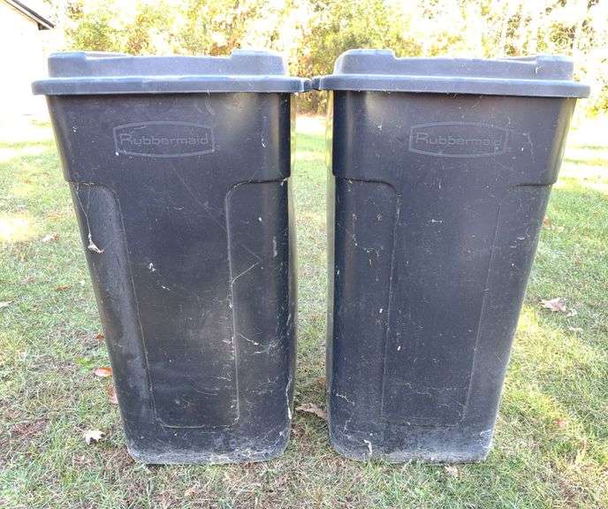 Two Rubbermaid 50 Gallon Bins w/ Lids