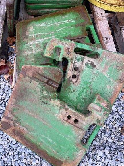 Four John Deere 50 Series Front Suitcase Weights