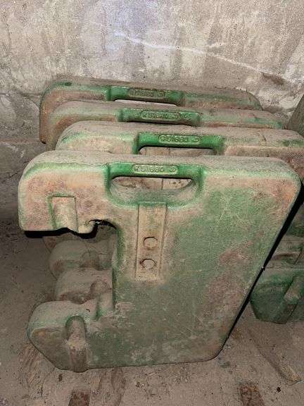 Four John Deere 40 Series Tractor Front Weights