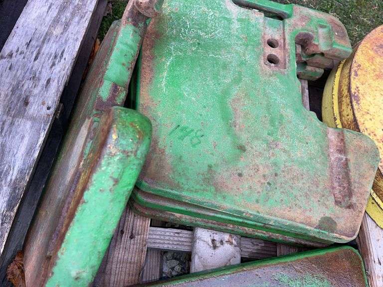 Four John Deere 50 Series Front Suitcase Weights