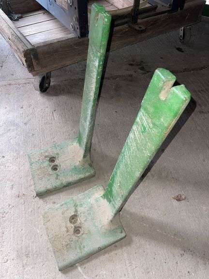 Two John Deere Starter Weights