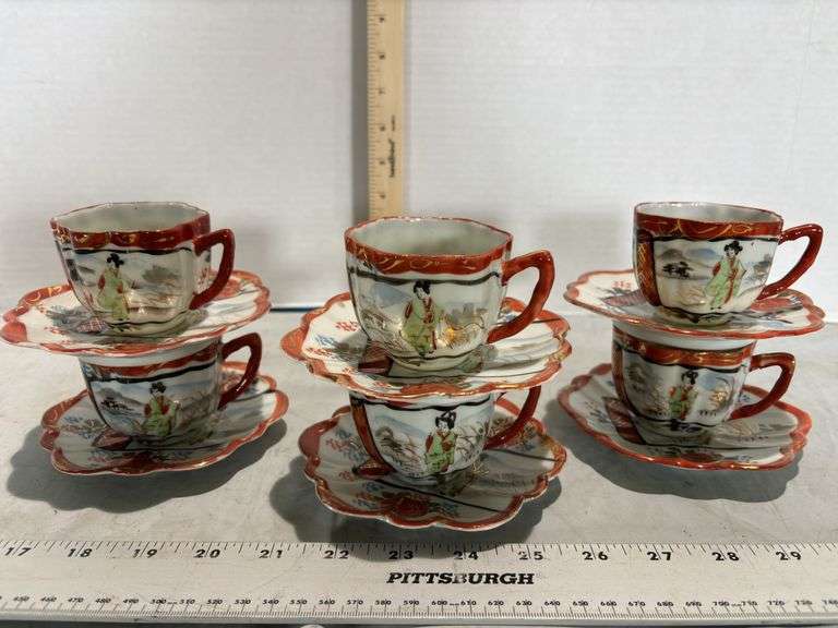 Six Kutani porcelain teacup and saucer featuring a hand-painted geisha Design