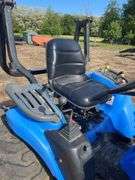 2005 New Holland TC33DA Tractor w/ 14LA 60” Loader & 914A 72” Belly Mower