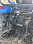 2005 New Holland TC33DA Tractor w/ 14LA 60” Loader & 914A 72” Belly Mower