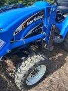 2005 New Holland TC33DA Tractor w/ 14LA 60” Loader & 914A 72” Belly Mower