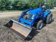 2005 New Holland TC33DA Tractor w/ 14LA 60” Loader & 914A 72” Belly Mower