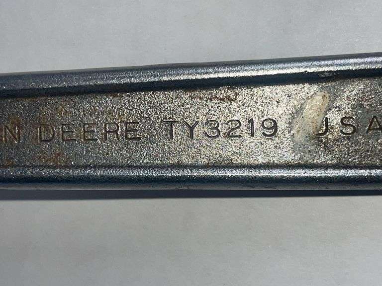 Four John Deere Wrenches