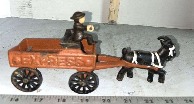 Three Cast Iron Express Wagons Pulled By Goats