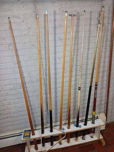 Seven Cue Sticks, One Shot Assist, & Cue Stick Rack