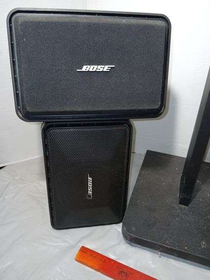 Four Bose Speakers and Two Stands