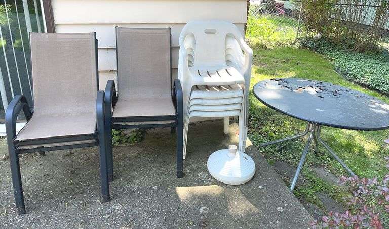 Four Patio Chairs & Five Stackable Plastic Chairs + 42” Round Metal Table & Umbrella