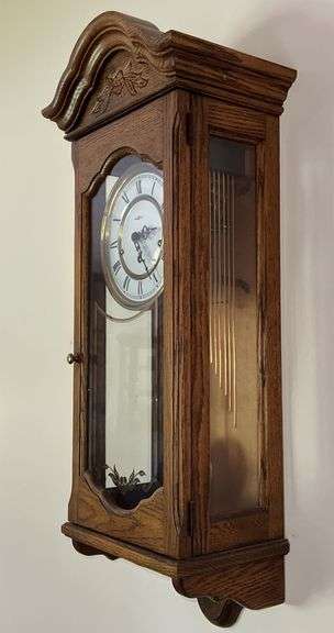 Howard Miller Oak Regulator Wall Clock (32”T,10.5”L,7”D)