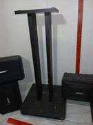 Four Bose Speakers and Two Stands