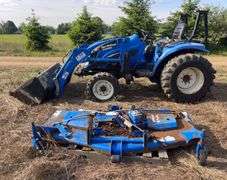 2005 New Holland TC33DA Tractor w/ 14LA 60” Loader & 914A 72” Belly Mower