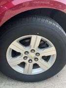 2009 Red Jewel Chevrolet FWD 1LT Traverse w/ 7 Passenger Seating