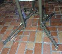 MCM 47"×35.5"×29.5" Table & Four Leather Rolling Barrel Chairs