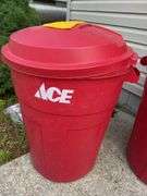 Two Rubbermaid Roughneck 32 Gallon Trash Cans w/ Lids