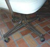 MCM 47"×35.5"×29.5" Table & Four Leather Rolling Barrel Chairs