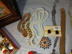 Neclaces, Ear Rings and Jewelry Box with Clock