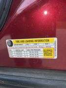 2009 Red Jewel Chevrolet FWD 1LT Traverse w/ 7 Passenger Seating