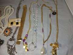 Neclaces, Ear Rings and Jewelry Box with Clock