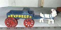 Three Cast Iron Express Wagons Pulled By Goats