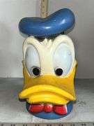 12" Tall Chalkware Kewpie Doll & 1970’s Donald Duck Vinyl Bank