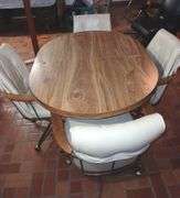 MCM 47"×35.5"×29.5" Table & Four Leather Rolling Barrel Chairs