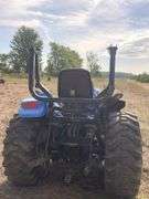 2005 New Holland TC33DA Tractor w/ 14LA 60” Loader & 914A 72” Belly Mower