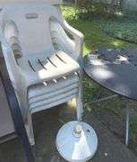 Four Patio Chairs & Five Stackable Plastic Chairs + 42” Round Metal Table & Umbrella