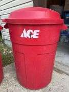 Two Rubbermaid Roughneck 32 Gallon Trash Cans w/ Lids