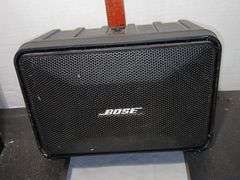 Four Bose Speakers and Two Stands