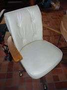 MCM 47"×35.5"×29.5" Table & Four Leather Rolling Barrel Chairs