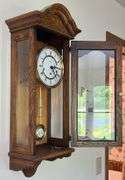Howard Miller Oak Regulator Wall Clock (32”T,10.5”L,7”D)