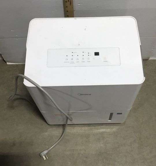 Midea Dehumidifier - Powers On When Plugged In