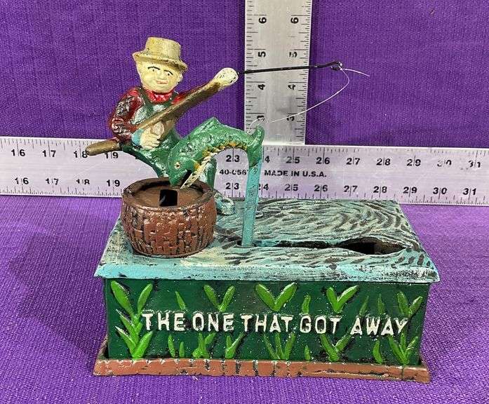 Vintage Cast Iron Mechanical Coin Bank “The One That Got Away”