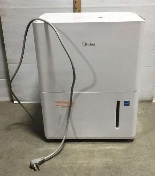 Midea Dehumidifier - Powers On When Plugged In
