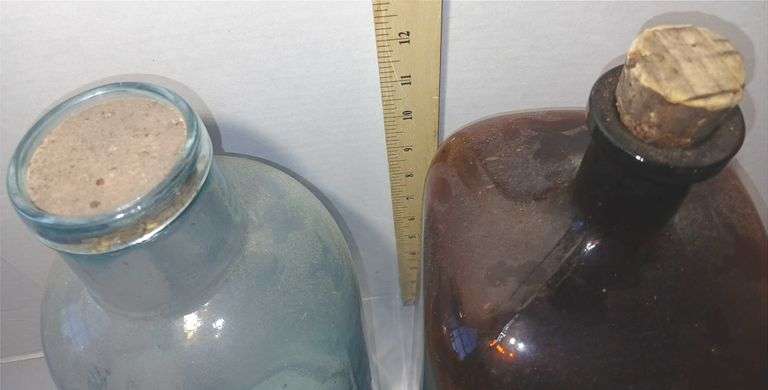Two Large Glass Bottles from Detroit