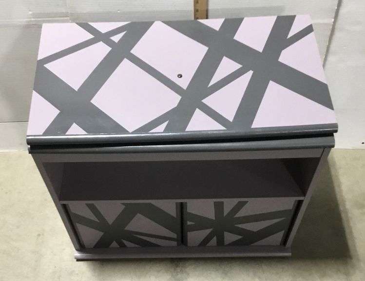 Purple and Black Painted Swiveling entertainment  Stand 29”x23”x13”