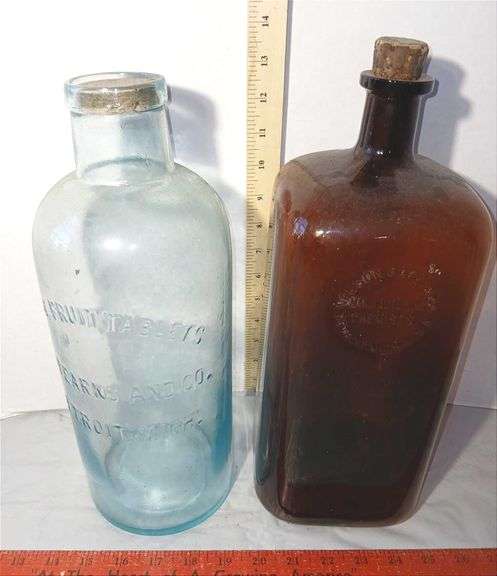 Two Large Glass Bottles from Detroit