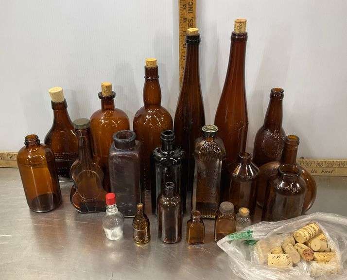 Tote with Lid Filled with Vintage Glass Bottles