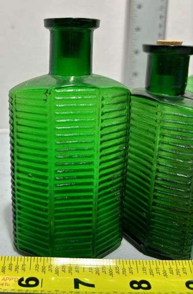 Collection of CLC Company Green Glass Medicine Bottles