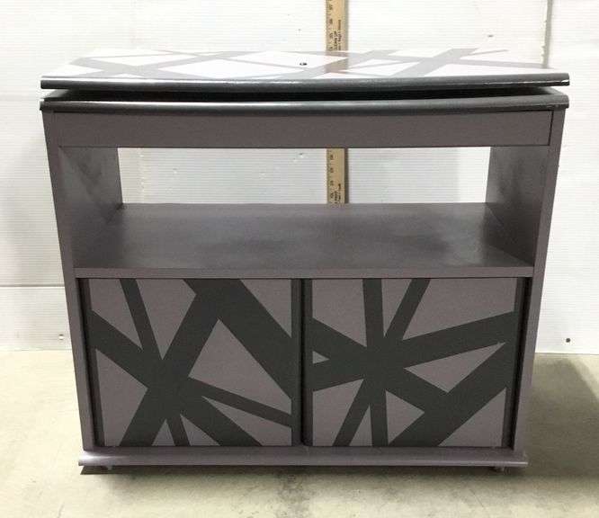 Purple and Black Painted Swiveling entertainment  Stand 29”x23”x13”