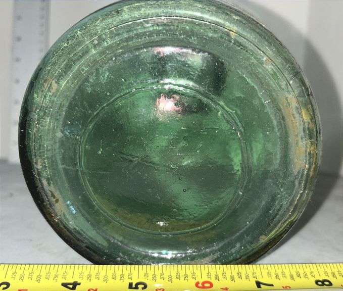 Two Primitive Green Wine Bottles