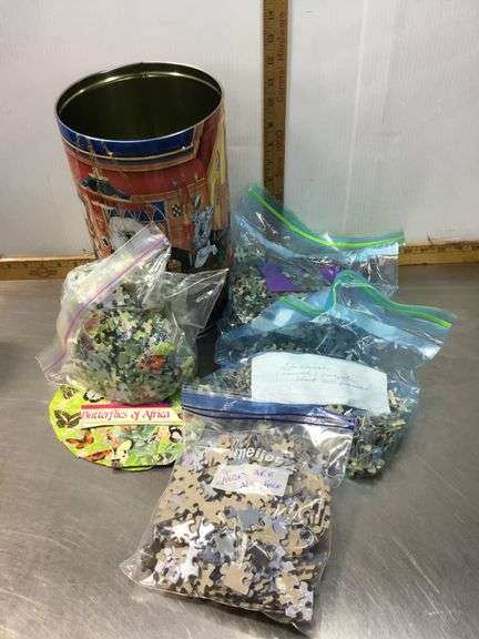 5 Tins With Puzzles