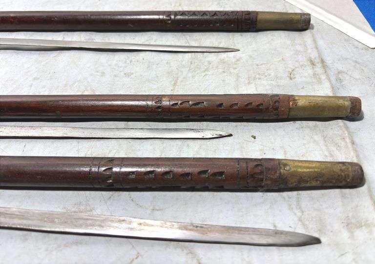 Three Hand Carved Sword Canes